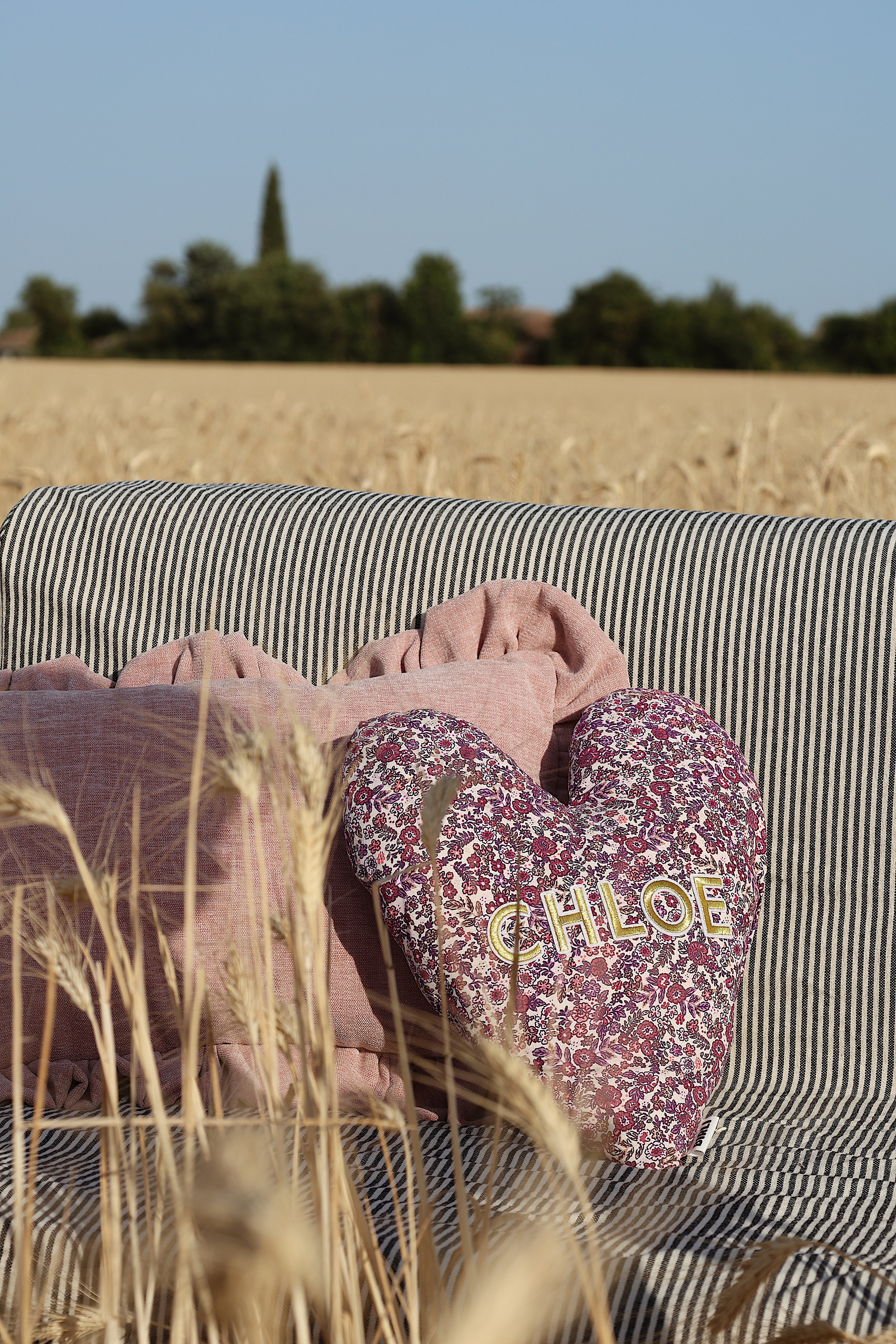 Le coussin coeur fleuri
